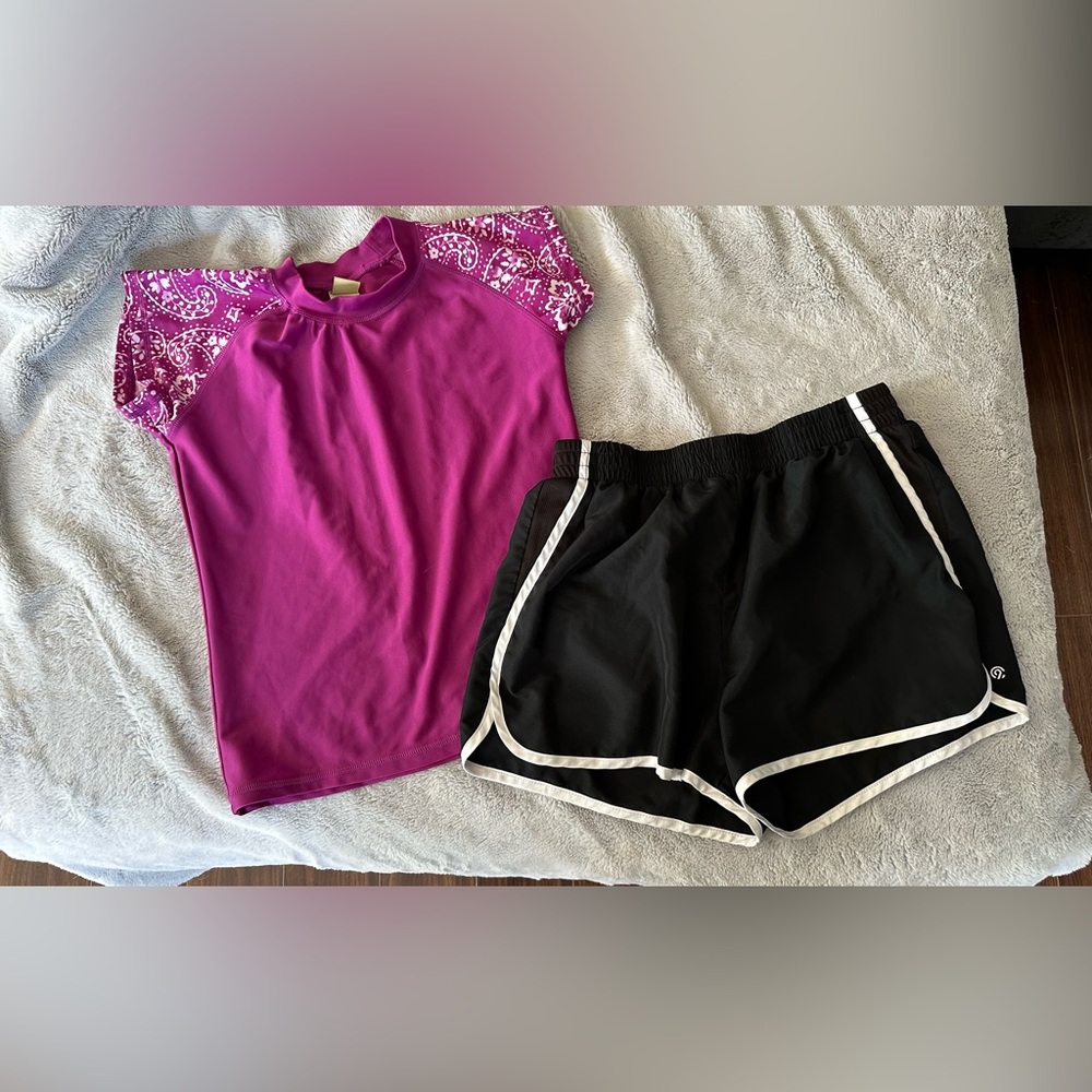 Bundle of girls clothing swim rash guard and athletic shorts size 14 16